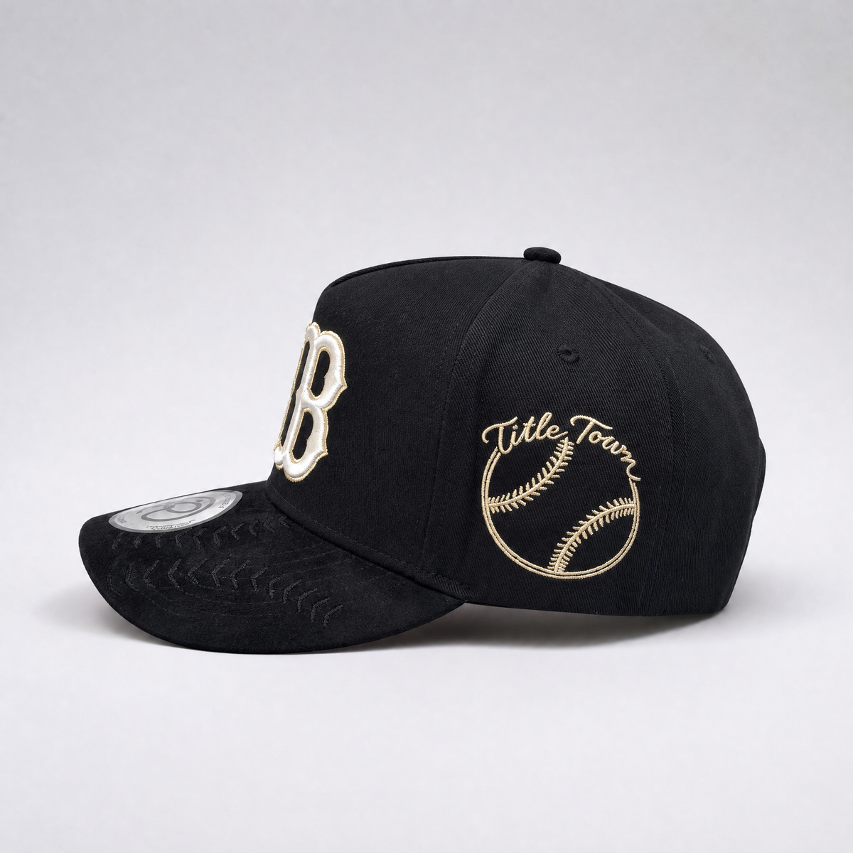 The 617 Snapback — City Kings Drop | Side view showing Title Town collector patch and gold chain