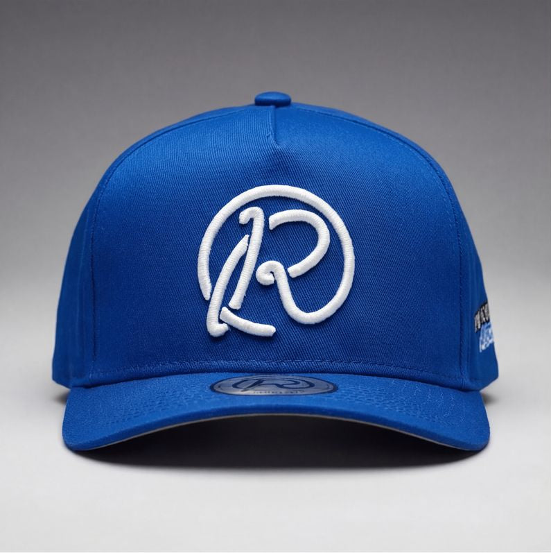 Blue cap with logos on a gray background