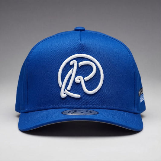 Blue cap with logos on a gray background
