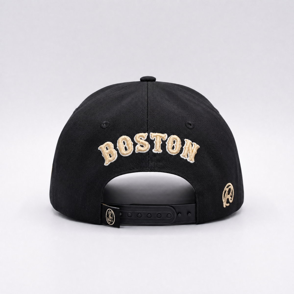 The 617 Snapback — City Kings Drop | Back view showing Boston script embroidery in gold and cream