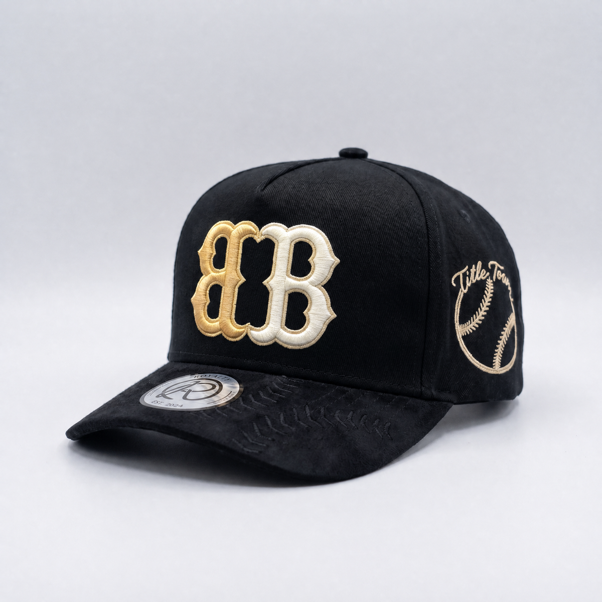 The 617 Snapback — City Kings Drop | Three-quarter front view | Black suede brim baseball stitch