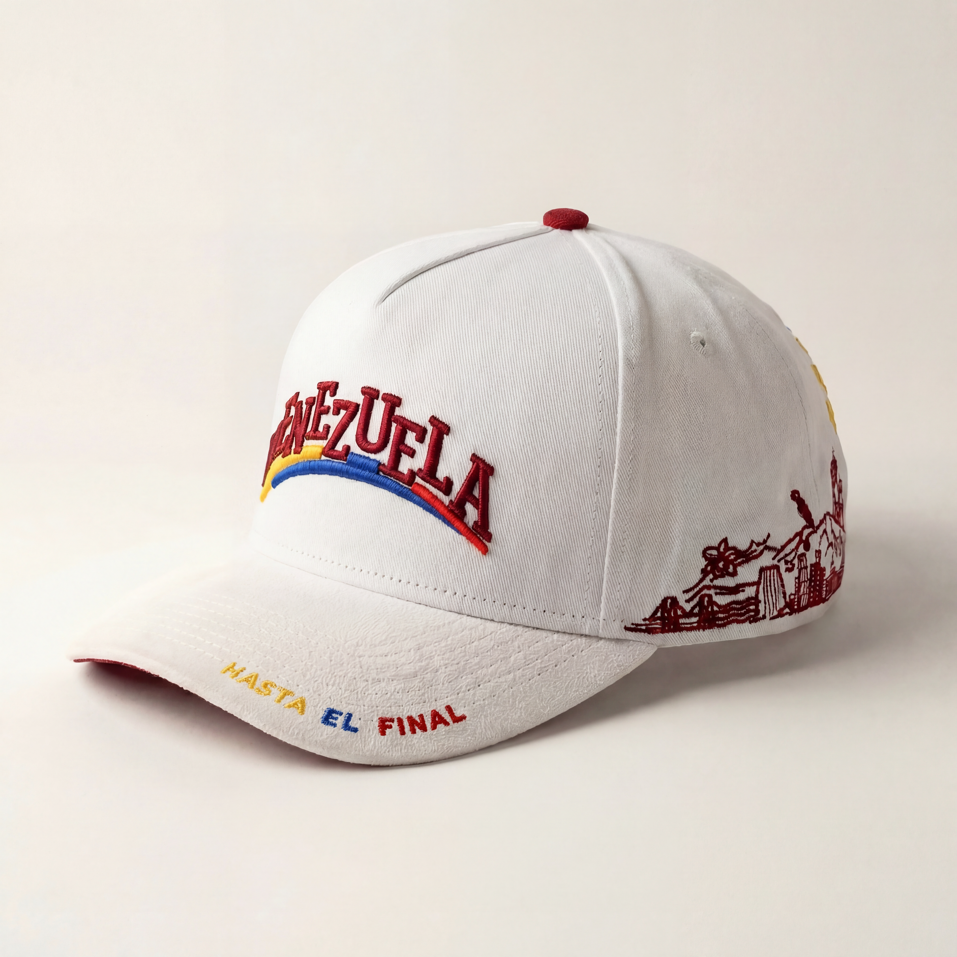 White cap with colorful text and graphics on a beige background