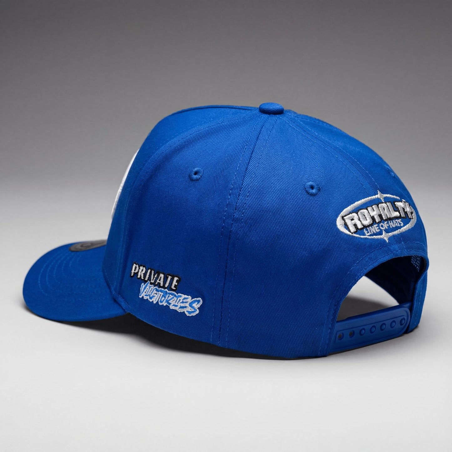 Blue cap with branding on a gray background