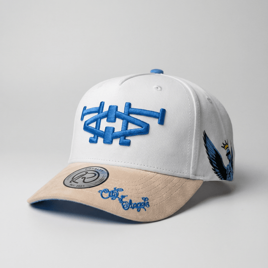 White and beige cap with blue logo on a gray background
