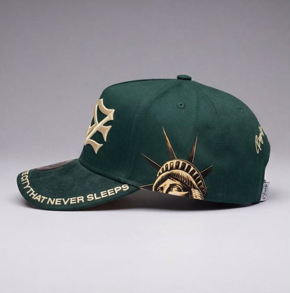 Green cap with embroidered designs and text on a gray background