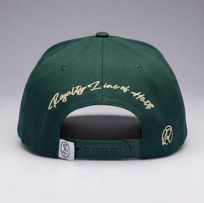 Green cap with detailed designs and text on a gray background